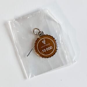 YOUNIQUE • Presenter Brown 10k $10,000 in Sales Charm